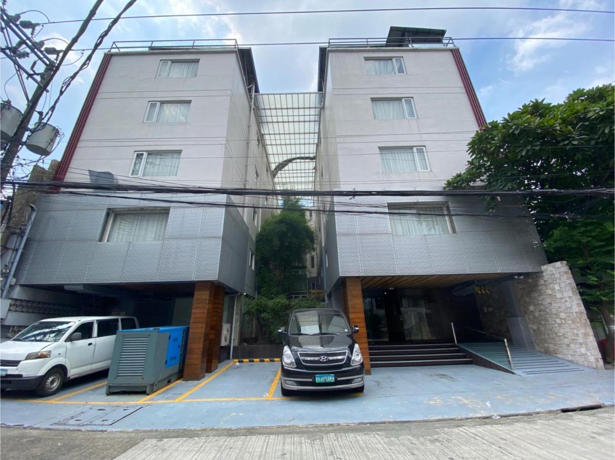 Capital O 820 Guijo Suites Makati มะนิลา ภายนอก รูปภาพ